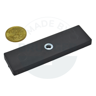 Rubberised magnet systems rectangular black with hole and countersink  | © BruggerGmbH