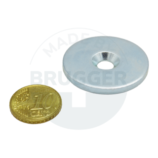 Metal disc with bore and counter bore, stop edge 90° | © Brugger GmbH